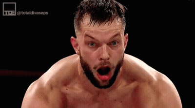 A Shirtless Man With A Beard Is Making A Funny Face With His Mouth Open . GIF