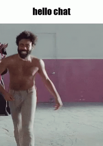 A Shirtless Man With A Beard Is Walking In Front Of A Pink Wall With The Words Hello Chat Above Him . GIF