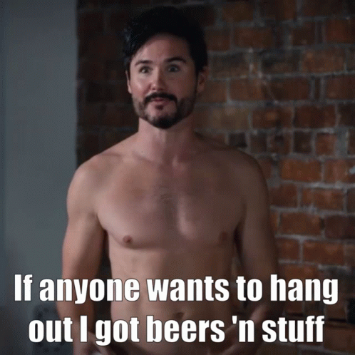 A Shirtless Man With A Beard Says If Anyone Wants To Hang Out I Got Beers ' N Stuff GIF
