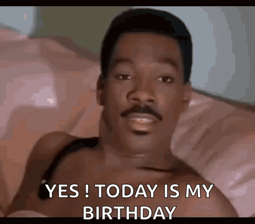 A Shirtless Man With A Mustache Is Laying On A Bed And Saying Yes Today Is My Birthday GIF