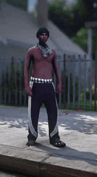 A Shirtless Man With A Scarf Around His Neck Is Standing On The Sidewalk GIF
