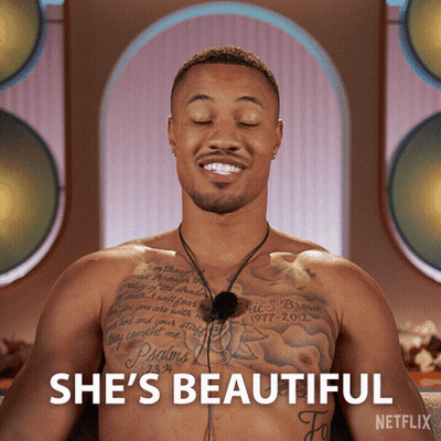 A Shirtless Man With A Tattoo On His Chest Says She 'S Beautiful On The Bottom GIF