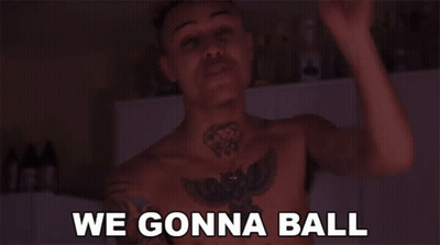 A Shirtless Man With A Tattoo On His Chest Says " We Gonna Ball " GIF