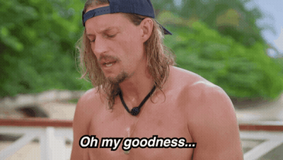 A Shirtless Man With Long Hair And A Hat Says " Oh My Goodness " GIF
