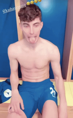 A Shirtless Man With The Number 20 On His Shorts GIF