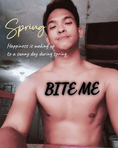 A Shirtless Man With The Word Bite Me Written On His Chest GIF