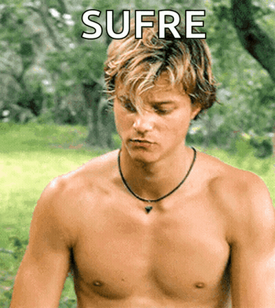 A Shirtless Man With The Word Sufre Written On The Bottom GIF