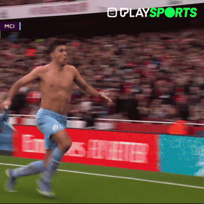 A Shirtless Soccer Player Is Running On A Field With A Playsports Logo In The Background GIF