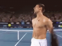 A Shirtless Tennis Player Is Standing On A Tennis Court GIF