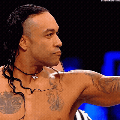 A Shirtless Wrestler Has A Necklace Around His Neck That Says ' The Next Thing ' GIF