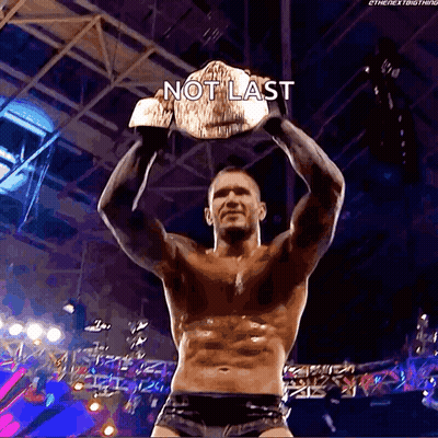 A Shirtless Wrestler Is Holding A Wrestling Championship Belt With The Caption " Not Last " GIF