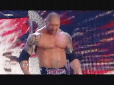 A Shirtless Wrestler With A Belt That Says Batista GIF