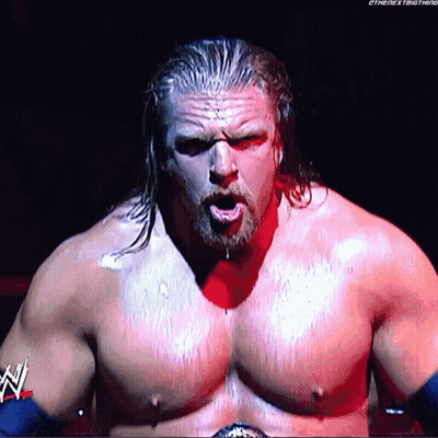 A Shirtless Wrestler With A Belt That Says The Next Thing GIF