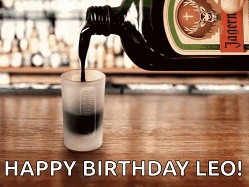 A Shot Glass Is Filled With Jagermeister Liquor GIF