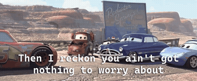 A Sign For Radiator Springs Is Displayed Behind A Group Of Cars GIF