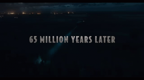 A Sign That Says 65 Million Years Later In The Dark GIF