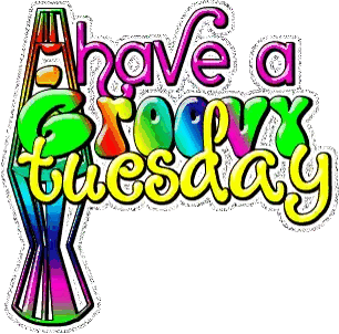 A Sign That Says Above A Groovy Tuesday With A Colorful Lava Lamp Sticker