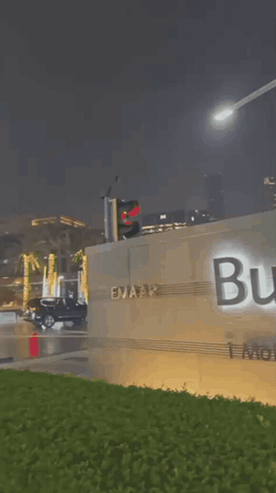 A Sign That Says ' Aifa Grand Boulevard ' In Arabic GIF