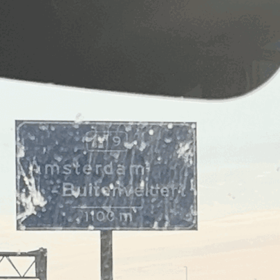 A Sign That Says Amsterdam Builtonwelter GIF