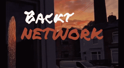 A Sign That Says Backt Network In Orange Letters GIF