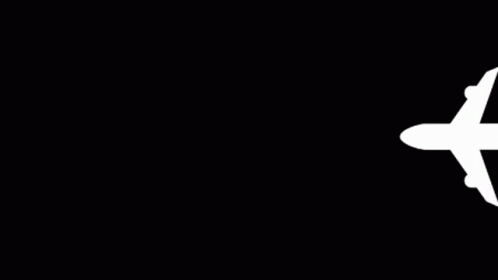 A Sign That Says Departures Medellin / Tenerife With An Airplane On It GIF