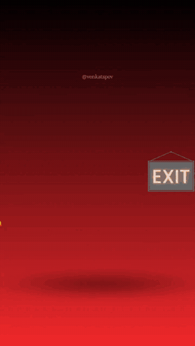 A Sign That Says Exit Hangs Above A Lion GIF