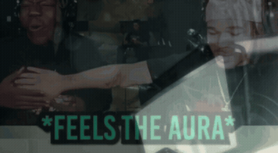 A Sign That Says " Feels The Aura " With Two People GIF