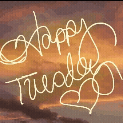 A Sign That Says " Happy Tuesday " With A Heart In The Middle GIF