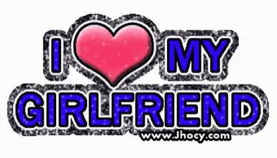 A Sign That Says I Love My Girlfriend With A Heart In The Middle GIF