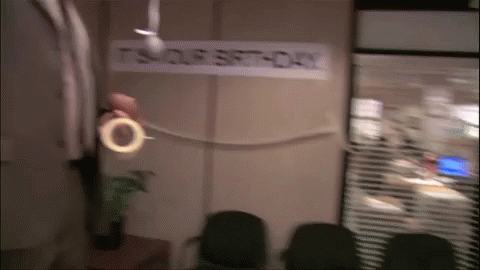 A Sign That Says It 'S Our Soft-Day Hangs From A Ceiling Fan GIF