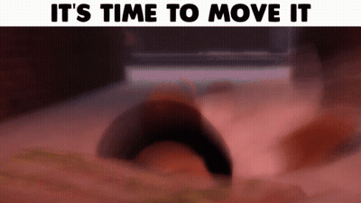 A Sign That Says It 'S Time To Move It With A Blurred Image GIF