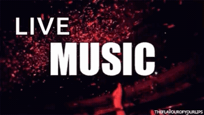 A Sign That Says `` Live Music '' On A Stage With Confetti Falling From The Sky . GIF
