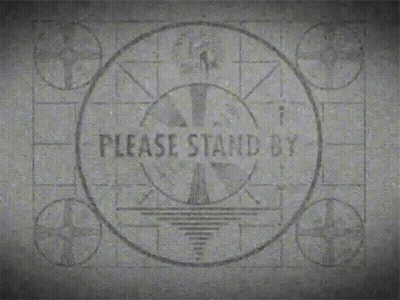A Sign That Says Please Stand By Is On A Black And White Background GIF
