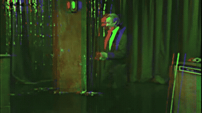 A Sign That Says " Remain Indoors " In White Letters GIF