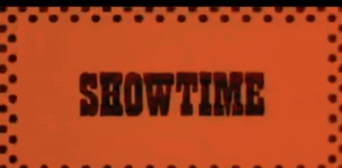 A Sign That Says Showtime On It In Red Letters GIF