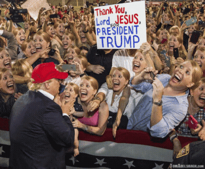A Sign That Says Thank You Lord For Jesus President Trump Is Being Held By A Crowd Of People GIF