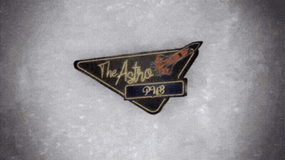 A Sign That Says The Astro Pub In A Triangle GIF