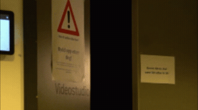 A Sign That Says Videostudio Is On A Door GIF