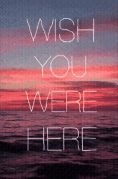 A Sign That Says Wish You Were Here On It GIF