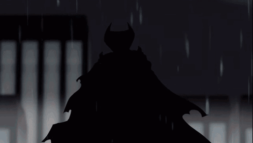 A Silhouette Of A Devil With Horns In Front Of A Red Background GIF