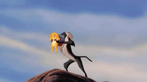 A Silhouette Of A Goat Standing On Top Of A Mountain GIF