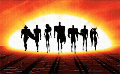 A Silhouette Of A Group Of People Standing In Front Of A Large Explosion GIF