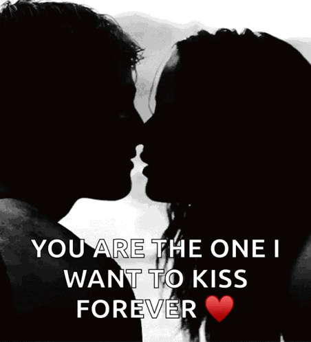 A Silhouette Of A Man And A Woman Kissing With The Words " You Are The One I Want To Kiss Forever " GIF