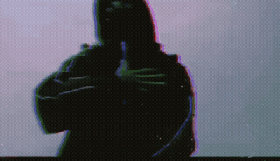 A Silhouette Of A Man In A Hooded Jacket Is Holding A Gun In His Hand . GIF
