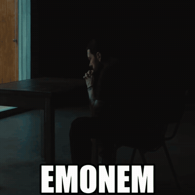 A Silhouette Of A Man Sitting At A Table With The Word Emonem Behind Him GIF