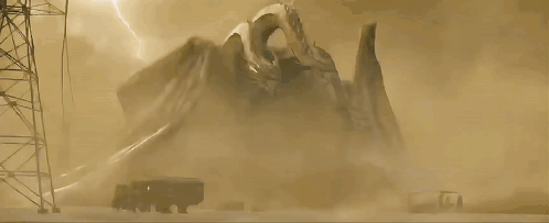 A Silhouette Of A Monster With The Letter S Visible GIF