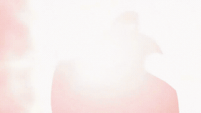 A Silhouette Of A Person In A Cape Is Against A Red Background GIF