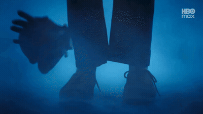 A Silhouette Of A Person Laying On The Ground With A Hbo Logo In The Corner GIF