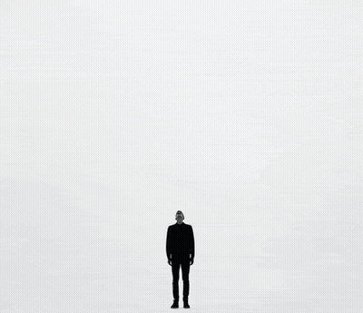 A Silhouette Of A Person Leaning Against A Wall With The Words " Feeling Stuck " Above Them GIF