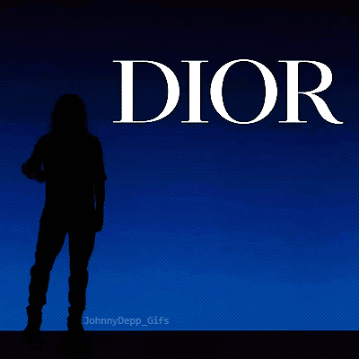 A Silhouette Of A Person Standing In Front Of A Blue Dior Logo GIF